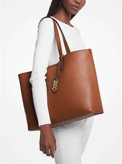 michael michael kors pebbled leather bucket bag|michael kors eliza tote.